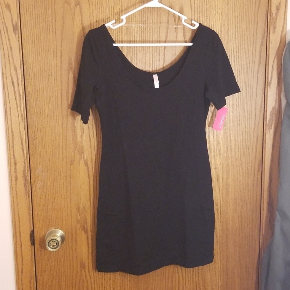 Black bodycon mini, short sleeved dress